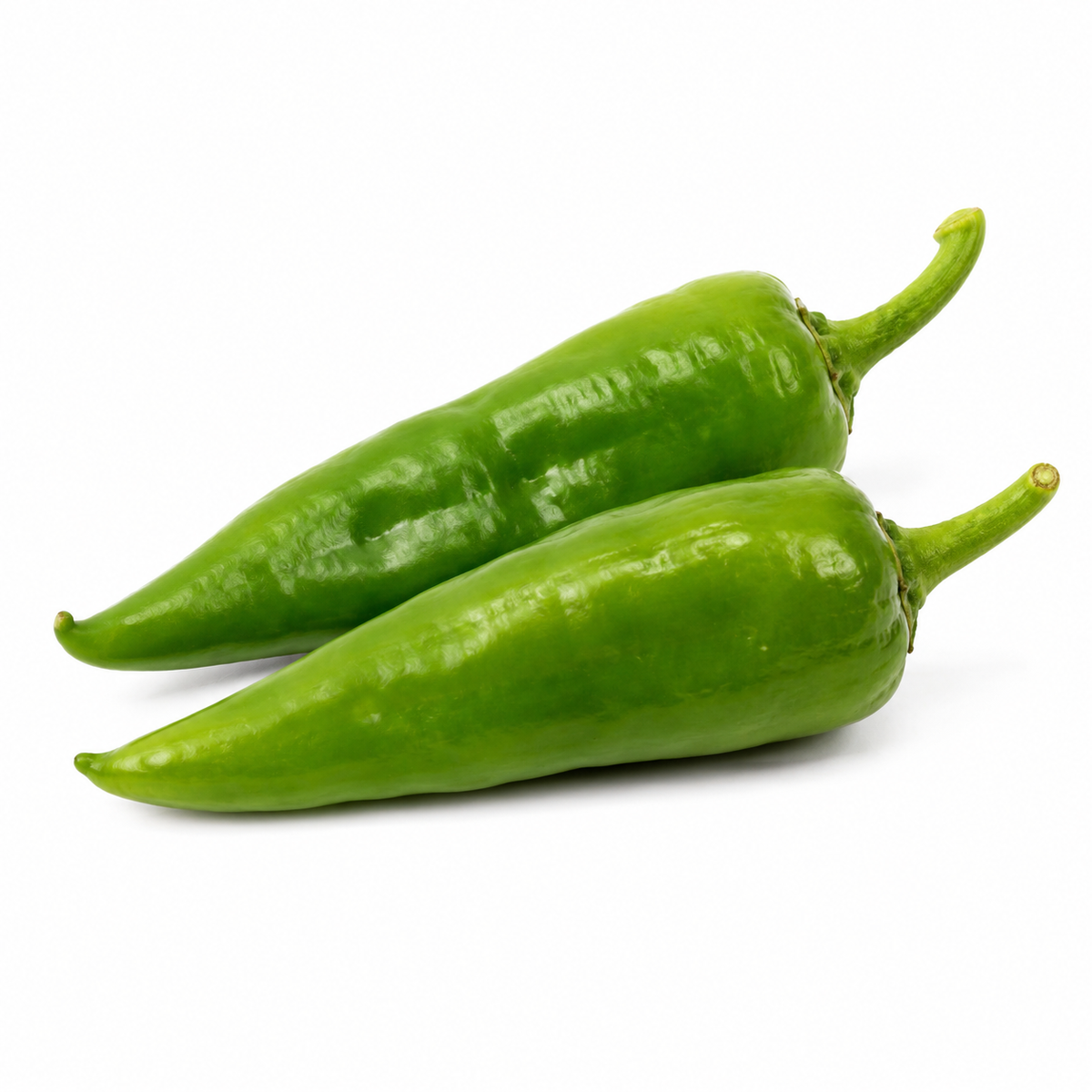 Fresh Pakora Green Chillies on white background