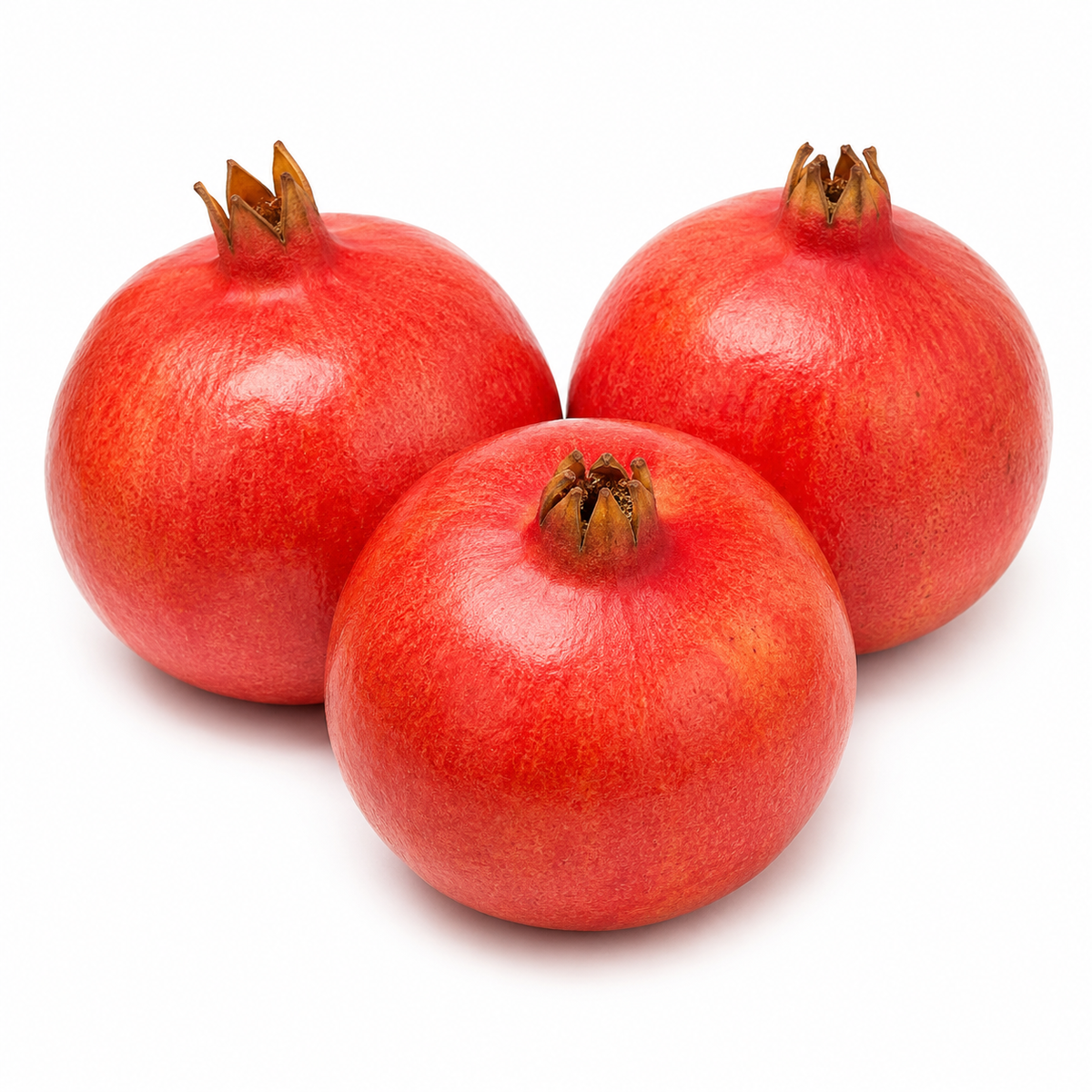 Fresh Pomegranates on white background